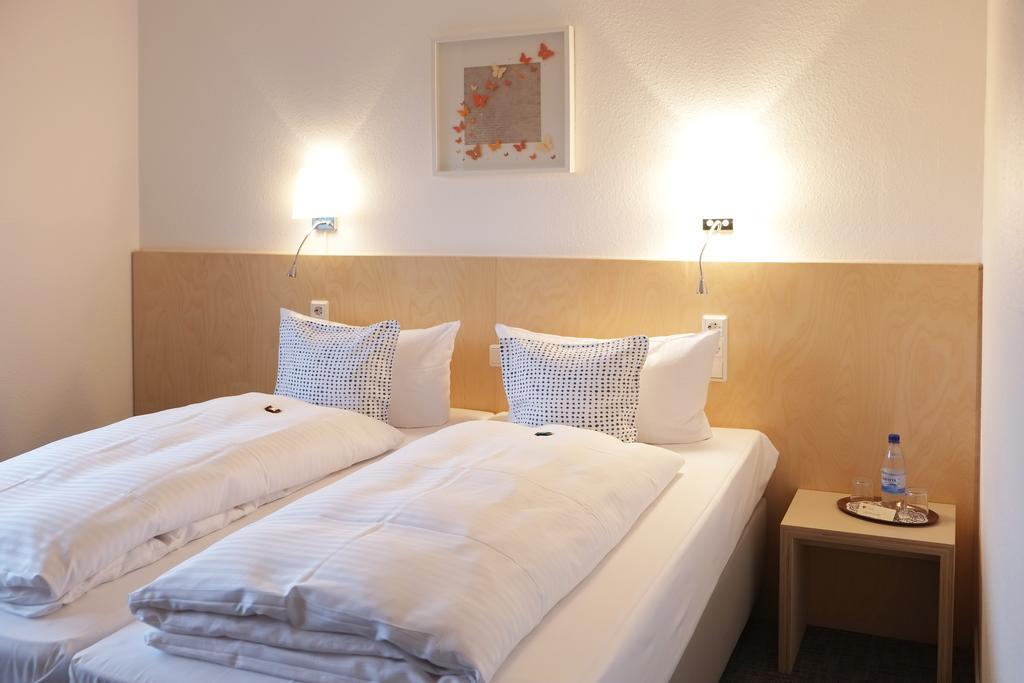 Stadthotel Am Buehnenhaus Кавелар Номер фото
